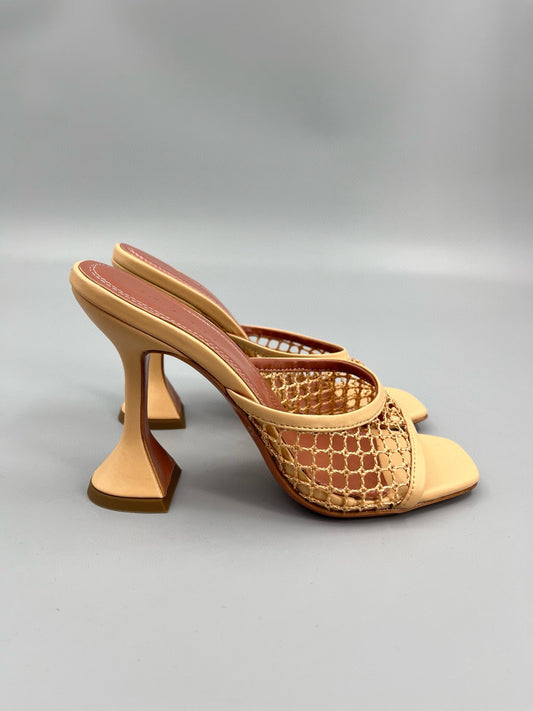 AMINA M HEELS