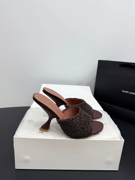 AMINA M HEELS