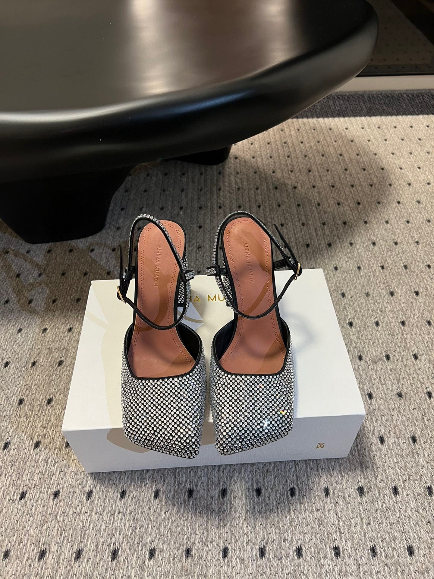 AMINA M HEELS