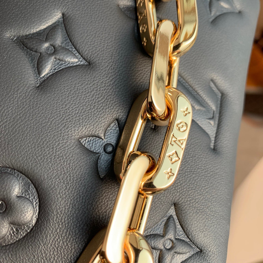 LOU BELTBAG COUSSIN
