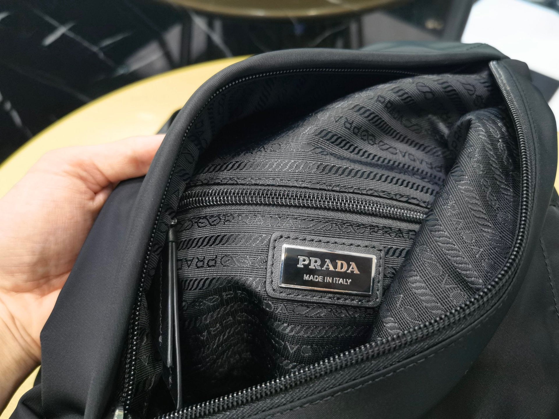 PD RE-NYLON AND LEATHER BACKPACK