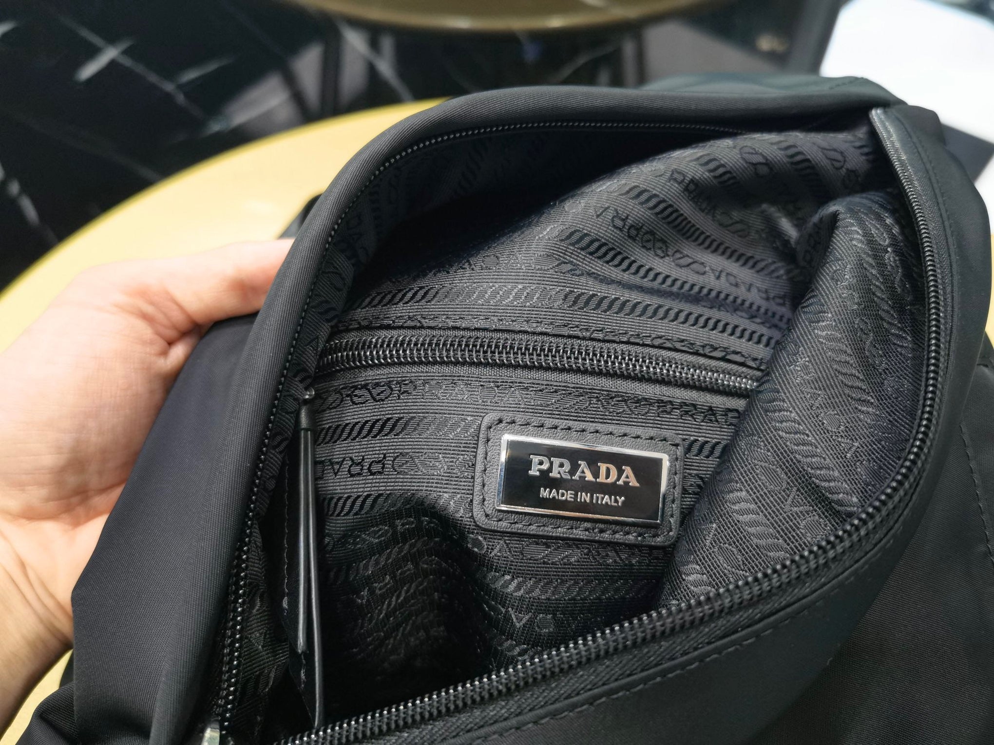 PD RE-NYLON AND LEATHER BACKPACK