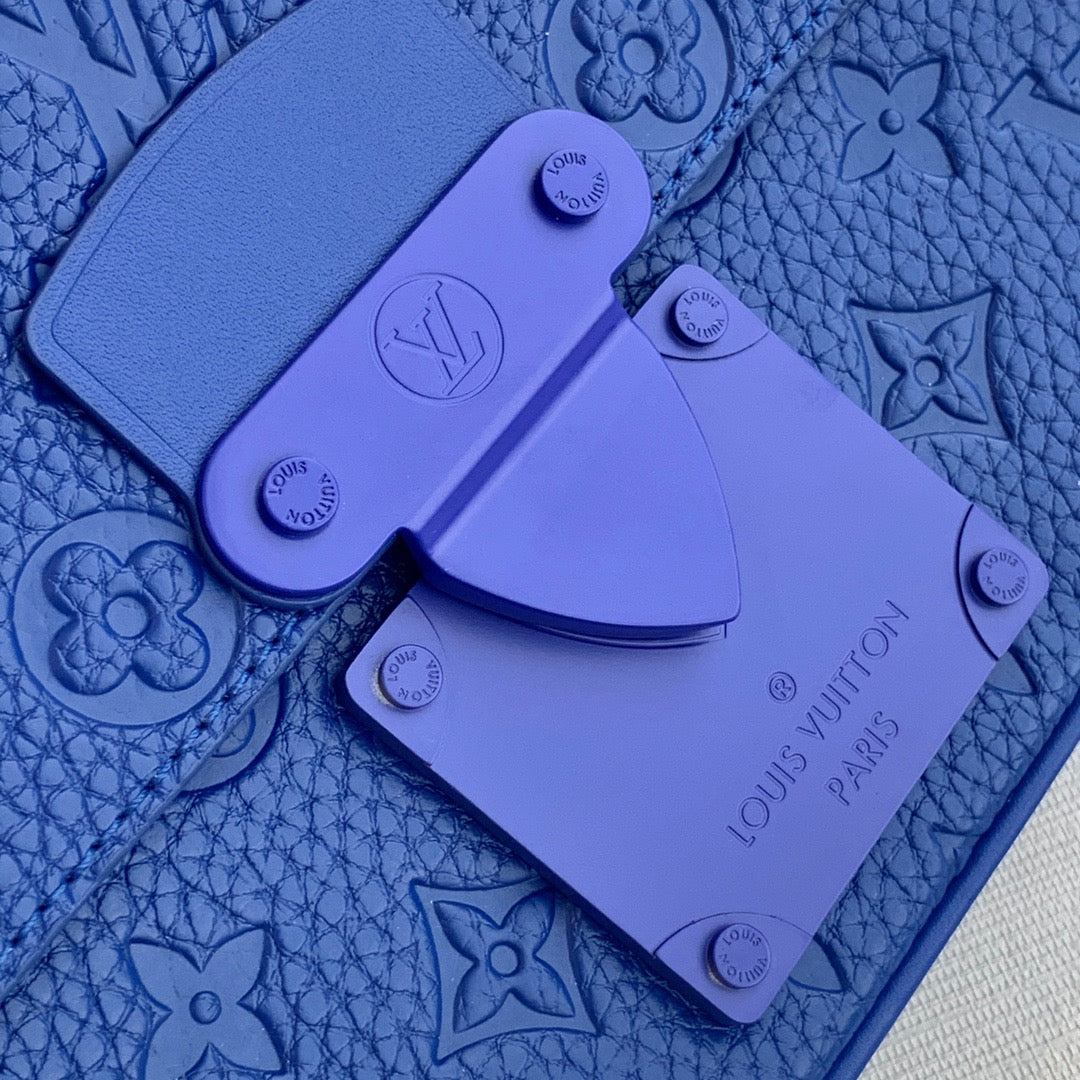 LOU S LOCK SLING BAG